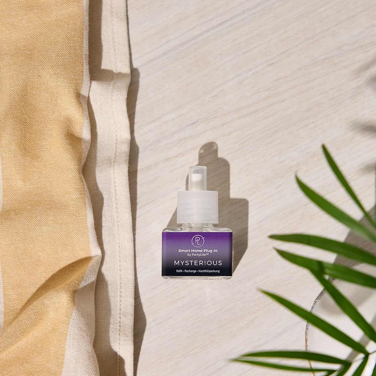 Mysterious Refill for the Smart Home Plug in shown against a light grained wooden background